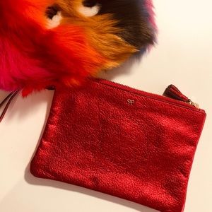 Anya hindmatch shimmering red hand clutch bag